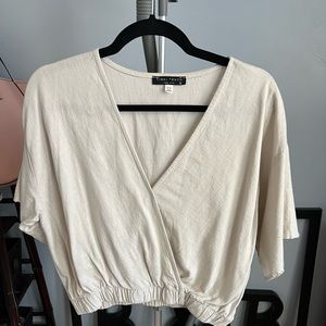 NWOT. Never Worn Tan Linen cross cross crop top